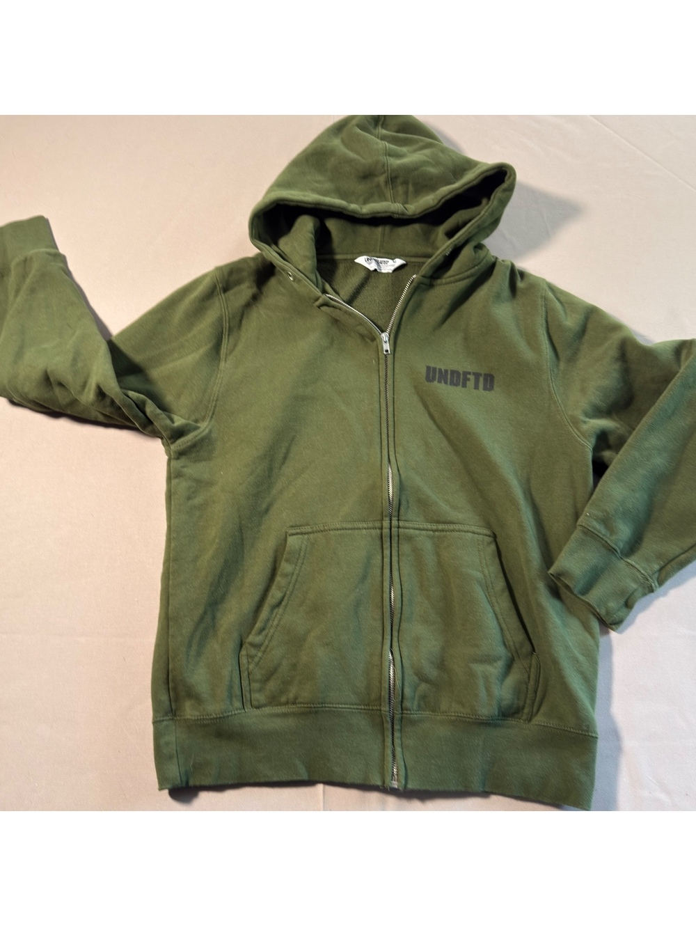 Undefeated olive zip-up hoodie